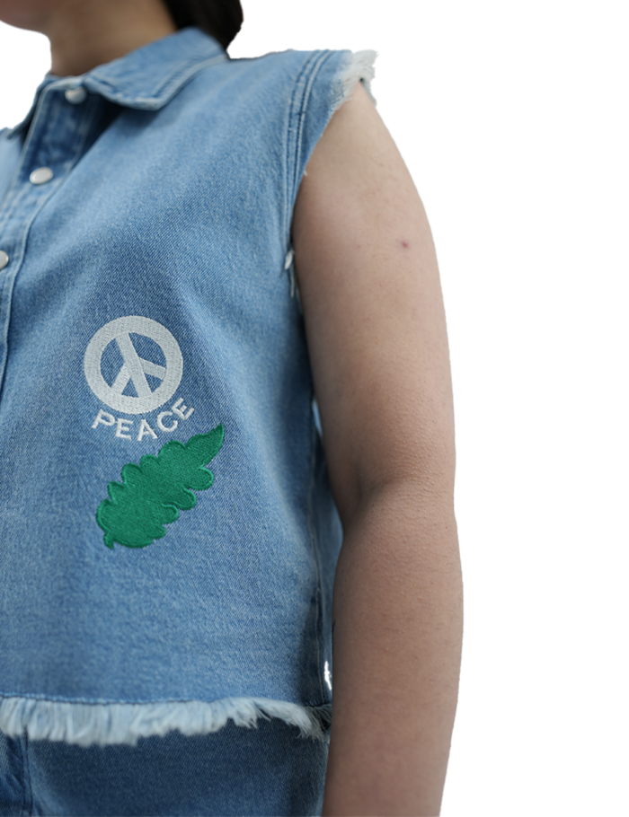 peace embrace on jeans and shacket